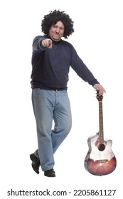 In Full Growth. Curly-haired Mature Man With A Guitar.