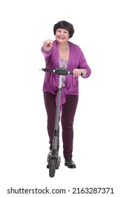 In Full Growth.happy Senior Woman With Electric Scooter.