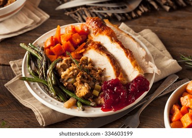 Full Homemade Thanksgiving Dinner With Turkey Stuffing Veggies And Potatos