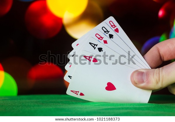 Full house poker cards combination on\
blurred background casino luck fortune card\
game
