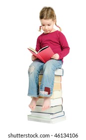 Full Isolated Studio Picture From A Young Child Sitting On Some Books