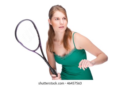 Full isolated studio picture from a young woman with squash racket