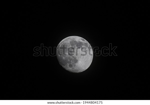 full\
large moon on a black background at night. full\
moon