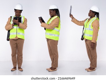 Full Length 20s Young African American Woman Architecture Client Engineer, Working Hard Thinking, Wear Formal Pants And Shoes. Contractor Female Carry Internet Tablet Over White Background Isolated