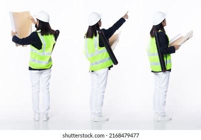 Full length 20s young Asian Woman client engineer architect, pointing finger up in Air, wear formal blazer pants shoes. Smile business female hold blueprint tablet over white background isolated - Powered by Shutterstock