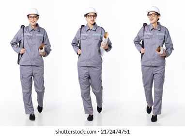 Full length 30s 40s Asian Woman Engineer Industry technician, walking forward left right, wear formal uniform safety gear. Smile factory female carry tube blueprint over white background isolated