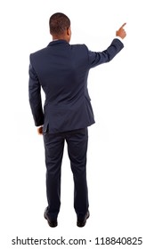 Full Length Of A African American Business Man Pointing At Something On White