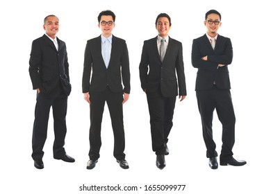 Full length Asian business man standing isolated on white background.