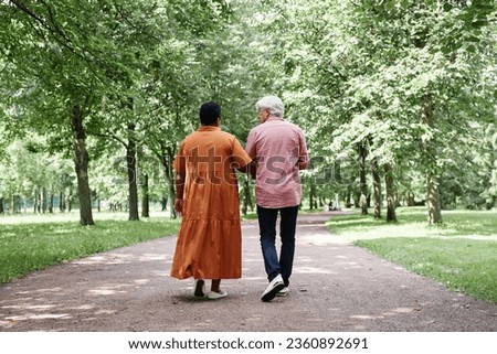 Similar – Image, Stock Photo Multiethnic couple holding hands