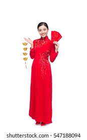 Full length of a beautiful Asian woman on traditional festival costume Ao Dai. Tet holiday. Lunar New Year. Text mean Lucky and Happiness.