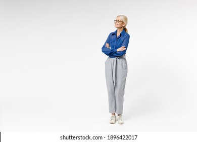 Full Length Blonde Pensive Successful Employee Business Woman 40s Wearing Blue Classic Shirt Gray Pants Glasses Formal Clothes Hold Hands Crossed Folded Isolated On White Background Studio Portrait