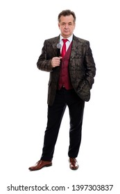 Full Length Body Of Happy And Successful Senior Man 60-65 Years Old. Businessman Senior Stand In Beautiful Suit With Red Tie And White Shirt. Grinning Man Hold Microphone. Isolated On White Background