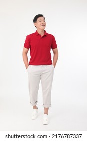 Full Length Body Portrait Of A Young Asian Handsome Man In Red Shirt, With Gesture, Isolated On White Background. Confident Concept Of A Walking Male Student.