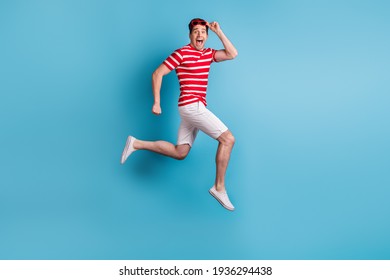 Full Length Body Side Profile Photo Man Jumping Running Fast On Sale Amazed Cheerful Isolated On Bright Blue Color Background