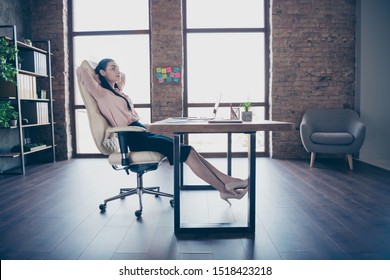 Full length body size photo of resting relaxing girl employed just for work in transnational company wearing formally heels shoes sitting at desktop - Shutterstock ID 1518423218