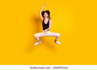 Full Length Body Size Photo Of Crazy Woman Jumping Like Rodeo Rider On Horse Isolated Bright Yellow Color Background