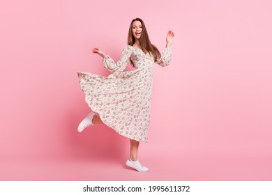 Full length body size photo pretty girl dancing laughing in summer isolated pastel pink color background