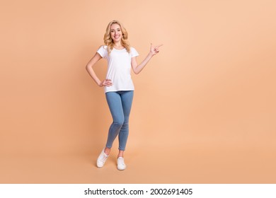 Full Length Body Size Photo Blonde Woman Showing Copyspace Isolated Pastel Beige Color Background