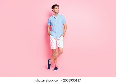 Full Length Body Size Photo Smiling Man In Blue Shirt White Shorts Looking Copyspace Isolated Pastel Pink Color Background