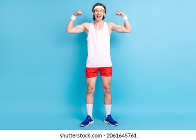 Full Length Body Size Photo Man Crazy Showing Strong Muscles Wearing Sportswear Isolated Pastel Blue Color Background