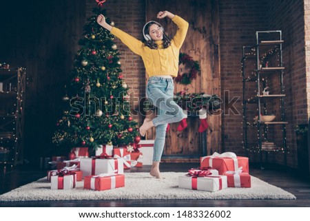 Full length body size photo of charming cute nice girl inspired with christmas music while dancing on carpet floor