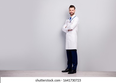 Full length body size profile side view of his he nice attractive content cheerful bearded guy clinic center owner director expert folded arms isolated over light white gray pastel color background - Shutterstock ID 1641730723