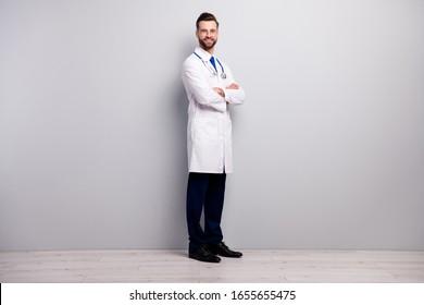 Full length body size profile side half-turned view of nice attractive cheerful content doc first aid medicare medico assistance center folded arms isolated on light white gray pastel color background - Shutterstock ID 1655655475
