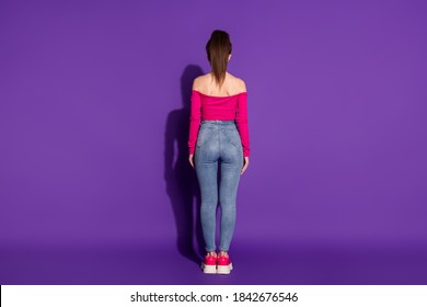 Full Length Body Size Rear Back Behind View Of Attractive Slim Fit Girl Wearing Smart Casual Look Isolated Bright Violet Color Background