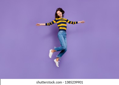 Full Length Body Size Side Profile Photo Beautiful She Her Lady Yell Scream Shout Jump High Flight Party Person People Playful Mood Wear Blue Yellow Striped Pullover Isolated Violet Purple Background