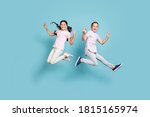 Full length body size view of her she his he nice attractive small little cheerful cheery friends friendship kids jumping showing v-sign having fun isolated over blue pastel color background