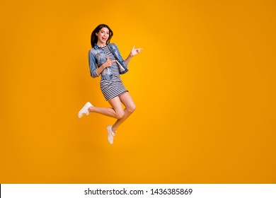 Full length body size view photo of careless playful funny person foolish indicate present choose decide advise ads adverts wear striped denim cool clothing summer isolated bright background