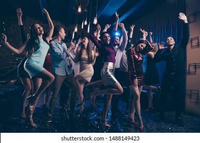 Full Length Body Size View Photo Of Funny Funky Youth Youngsters Raise Hands Band Listeners Loud Noise Indoors Discotheque Formalwear Dress Suit