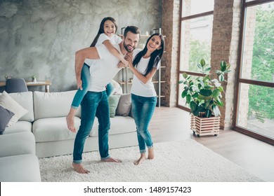 Full Length Body Size View Of Nice Attractive Friendly Careful Cheerful Brunette Family Schoolgirl Wearing Casual White T-shirts Jeans Having Fun At Industrial Loft Style Interior Living-room Indoor