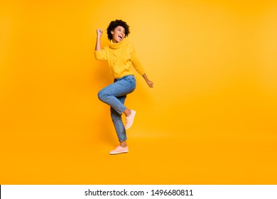 Full length body size view of her she nice attractive cheerful cheery content successful wavy-haired girl having fun free time rejoicing isolated on bright vivid shine vibrant yellow color background - Shutterstock ID 1496680811