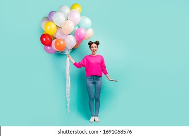 Full length body size view of nice attractive lovely cheerful cheery wavy-haired girl holding in hand air balls festal occasion isolated on bright vivid shine vibrant green blue color background