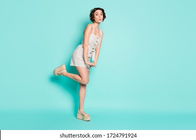 Full length body size view of her she nice attractive lovely charming pretty shy girlish cheery funny girl posing sending air kiss isolated over bright vivid shine vibrant blue color background