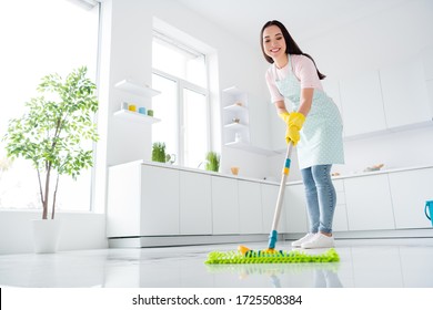 Full length body size view of her she nice attractive cheerful cheery hardworking girl making fast domestic work wiping perfect ceramic floor in modern light white interior kitchen indoors - Shutterstock ID 1725508384