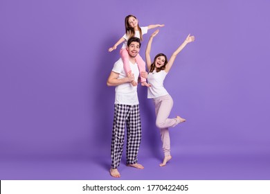 Full Length Body Size View Of Three Person Cheerful Family Dad Carrying Offspring Daughter Wearing Pajama Having Fun Day Daydream Isolated Bright Vivid Shine Vibrant Violet Color Background