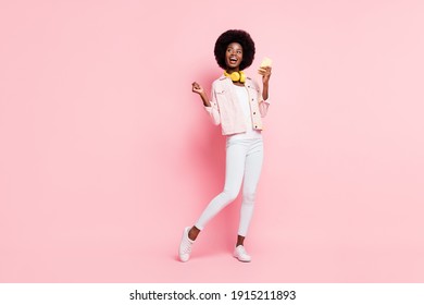 Full length body size view of lovely cheerful girl listening single pop hit bass dancing enjoying isolated over pink color background
