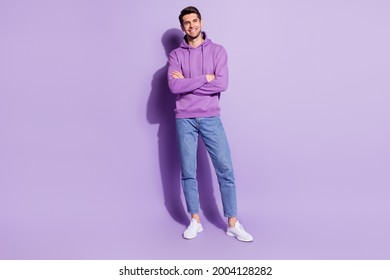 Full length body size view of attractive content cheerful guy folded arms posing isolated over purple violet color background - Powered by Shutterstock