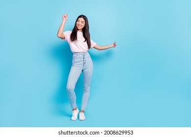 Full length body size view of attractive cheerful slender carefree girl dancing moving isolated over bright blue color background - Shutterstock ID 2008629953