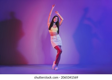 Full Length Body Size View Of Gorgeous Cheery Girl Dancing Isolated Over Vivid Violet Purple Neon Color Background