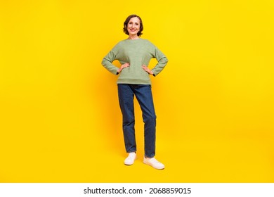 Full Length Body Size View Of Attractive Cheerful Grey-haired Woman Posing Hands On Hips Isolated Over Vivid Yellow Color Background