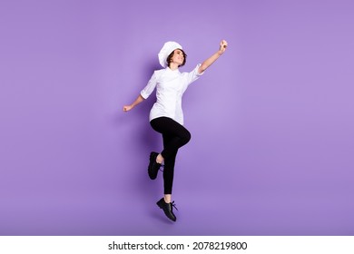 Full Length Body Size View Of Lovely Cheerful Chef Jumping Striving Isolated Over Bright Violet Purple Color Background