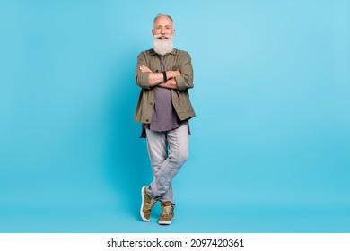 Full length body size view of attractive content cheery grey-haired man folded arms isolated over vivid blue color background - Shutterstock ID 2097420361