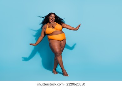 Full length body size view of attractive cheery funny carefree woman going having fun isolated over bright blue color background