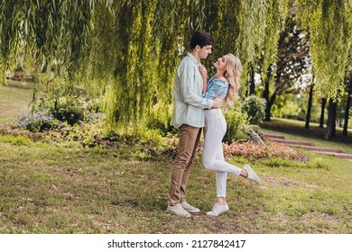 Full length body size view of two attractive cheerful couple hugging enjoying daydream honeymoon on fresh air outdoors - Powered by Shutterstock