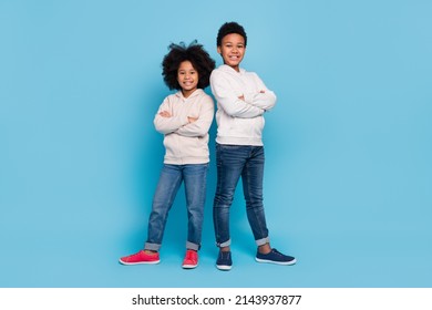 Full Length Body Size View Of Attractive Cheerful Kids Best Support Folded Arms Isolated Over Bright Blue Color Background