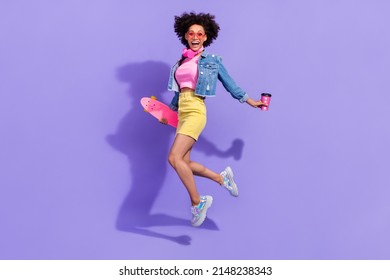 Full length body size view of attractive fit trendy girl jumping having fun action isolated on bright violet purple color background