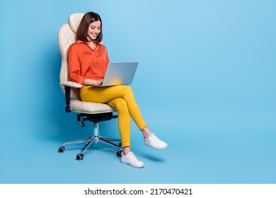 Full Length Body Size View Of Attractive Cheerful Focused Girl Writing Email Isolated Over Bright Blue Color Background